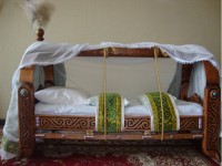 Баланы бесікке бөлеу міндет пе?